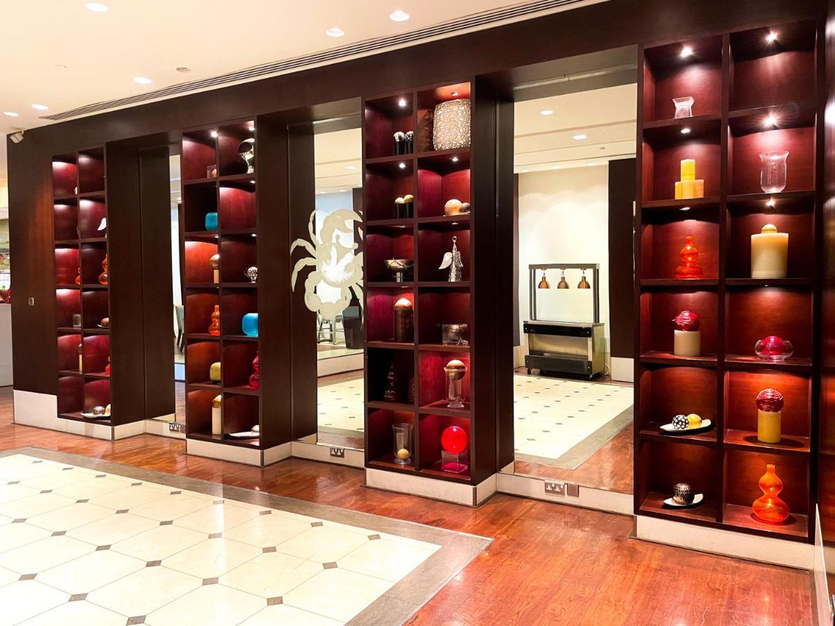 Moevenpick Grand Al Bustan Hotel Dubai Bagian luar foto The interior of the hotel