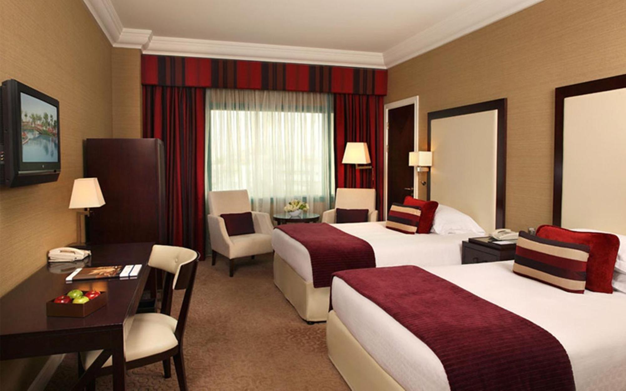 Moevenpick Grand Al Bustan Hotel Dubai Bagian luar foto A room at the hotel