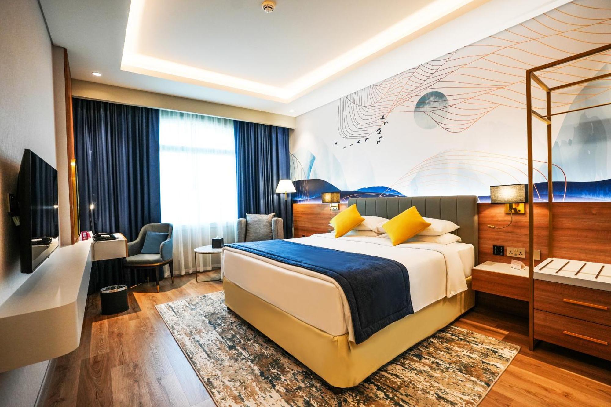 Moevenpick Grand Al Bustan Hotel Dubai Bagian luar foto Deluxe Room
