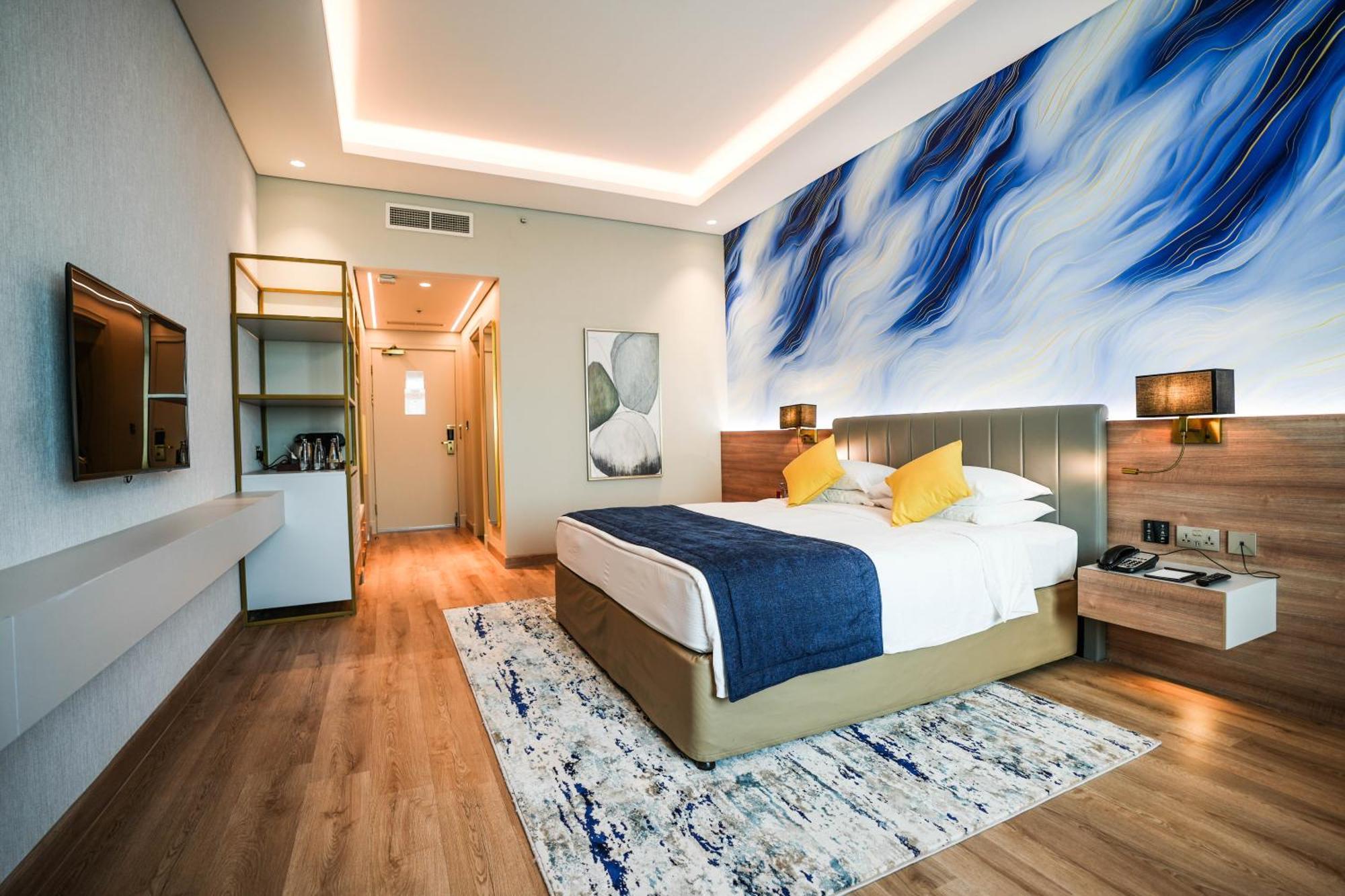 Moevenpick Grand Al Bustan Hotel Dubai Bagian luar foto Deluxe Room